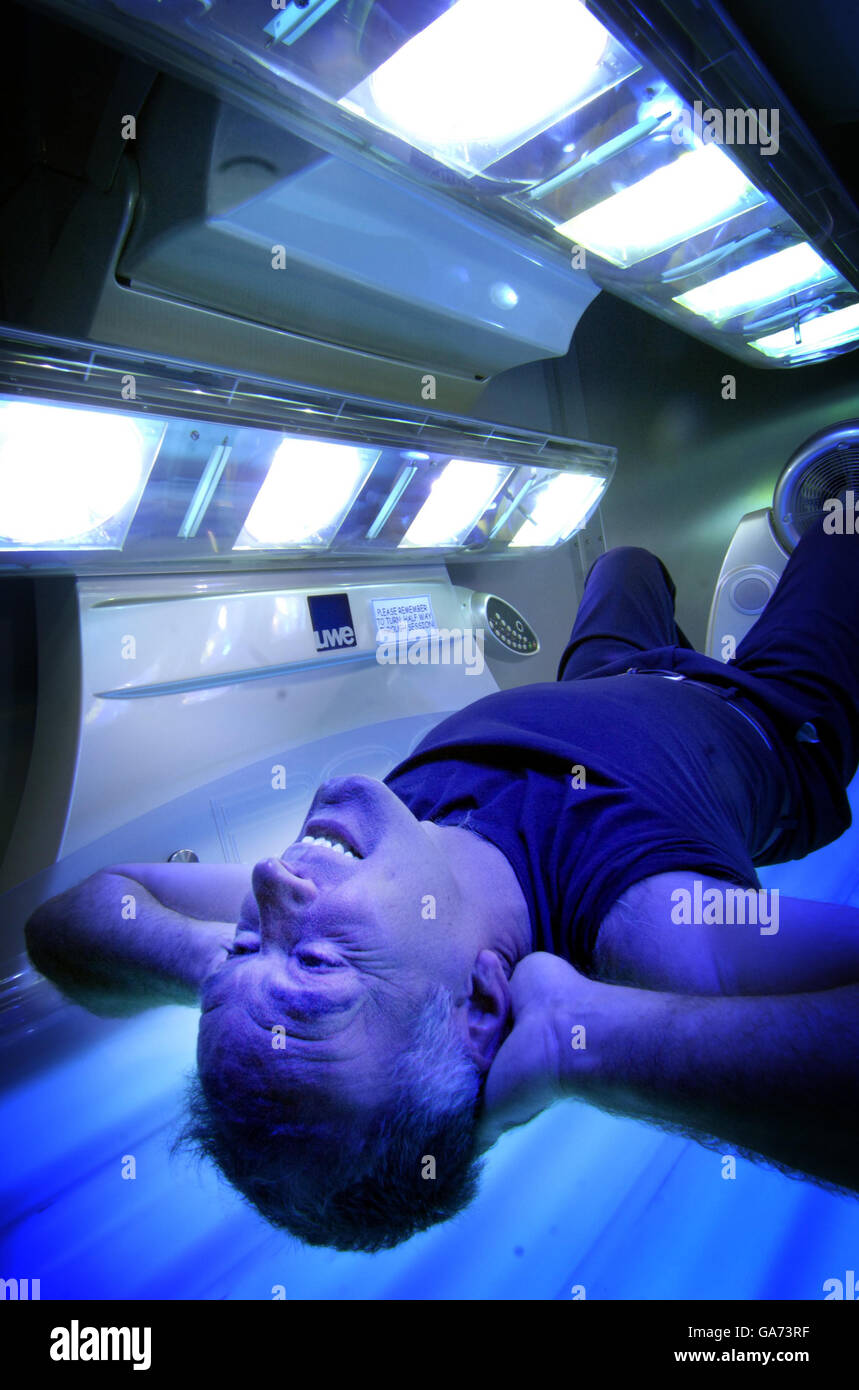 Former MSP Tommy Sheridan, Scotland's sunbed socialist posses for a