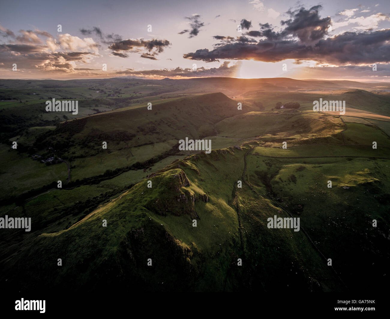 Aerial view of the setting sun over Chrome Hill, Peak District, Derbyshire, UK Stock Photo