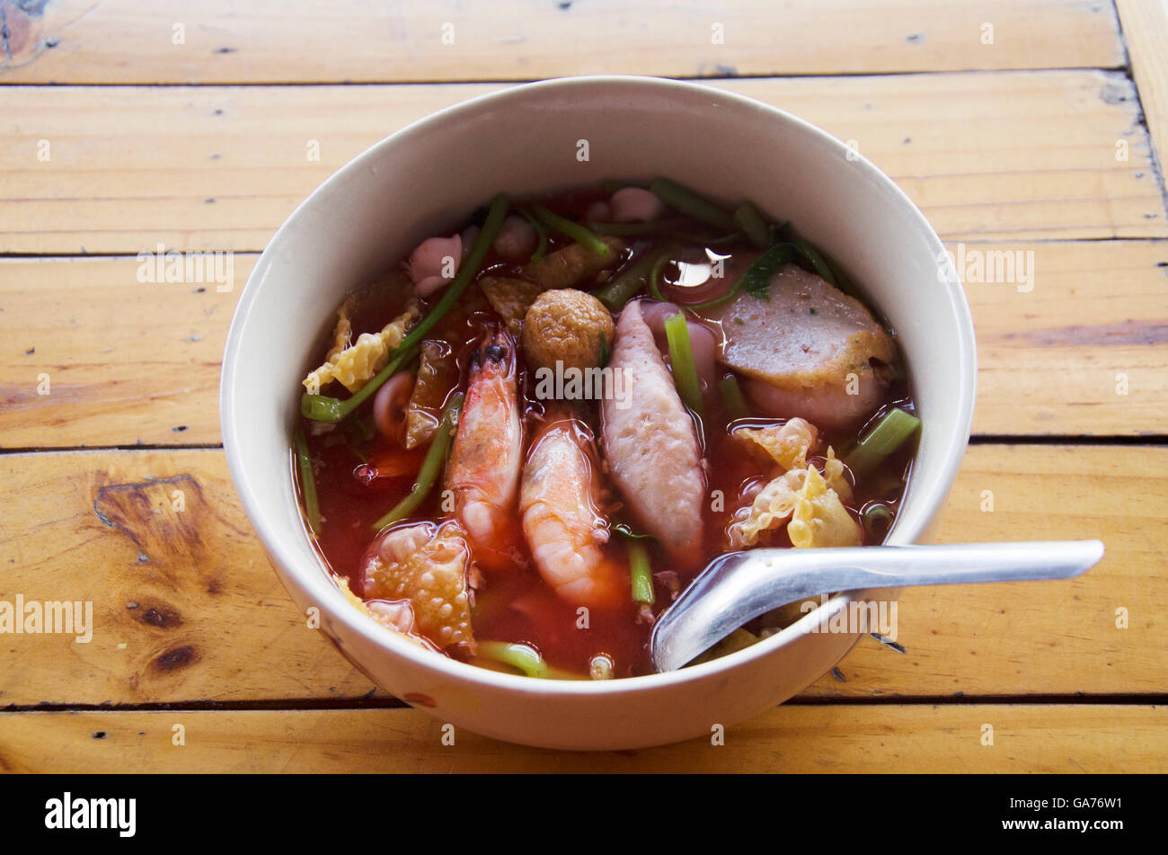 Yong tau foo or Pink seafood flat noodles called yentafo in Thailand Stock Photo