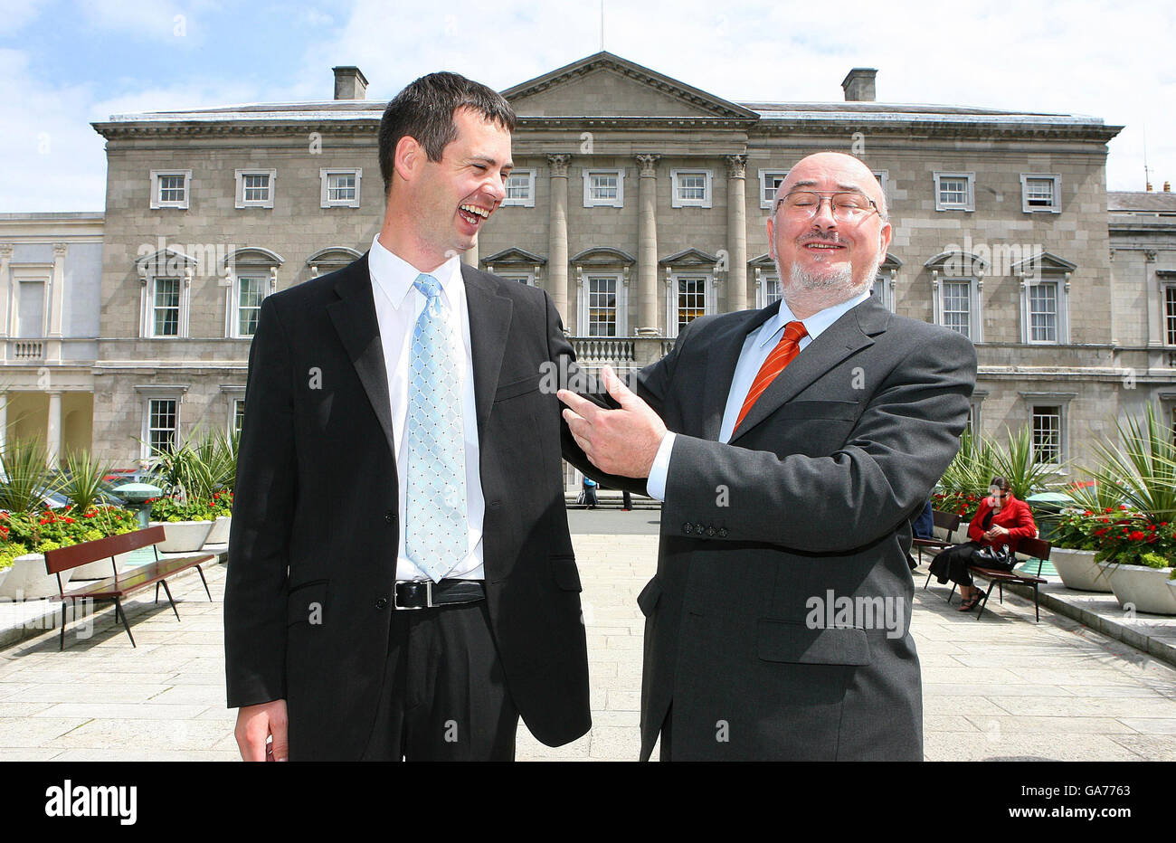 Pearse Doherty, Sinn Fein representative for Donegal SW, left, is congratulated on becoming a member of the Seanad Eireann by Caoimhghin O Caolain TD, outside Leinster House Dublin. Stock Photo