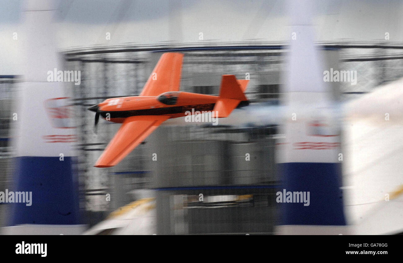 Red Bull Air Race pilot Nicolas Ivanoff of France speeds through the ...