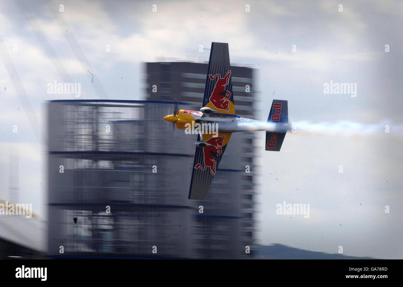 Red Bull Air Race pilot Peter Besenyei passes speeds through the 20m ...