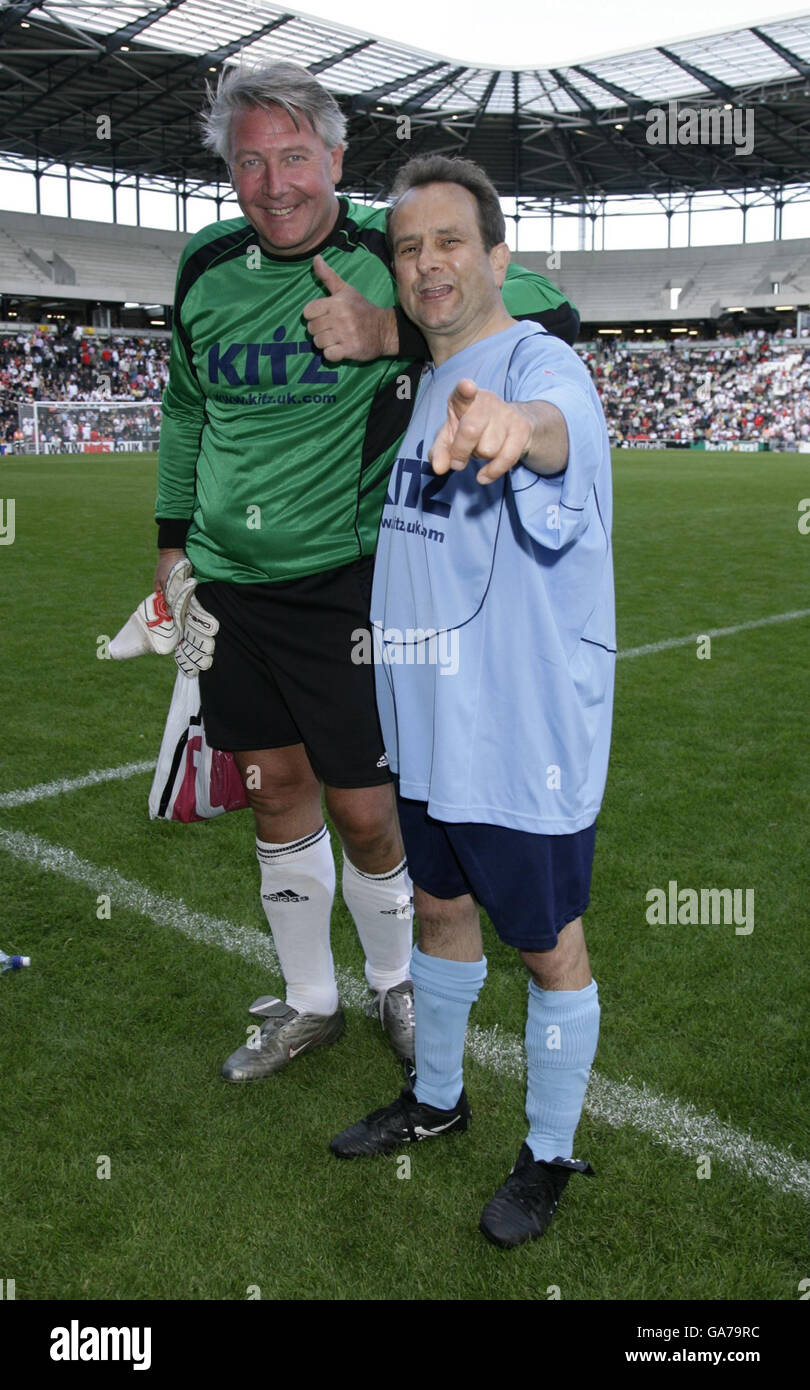 Soccer - The Alan Ball Memorial Cup - Stadium:mk. Tommy Walsh (L) and Timmy Mallet, during the Alan Ball Memorial Cup football match at Stadium:MK in Milton Keynes. Stock Photo