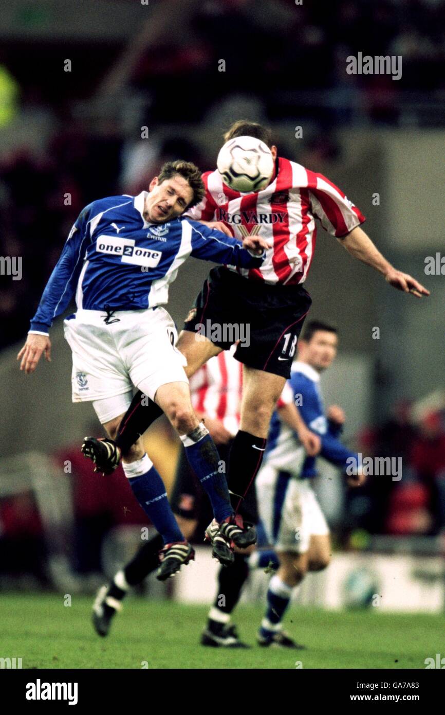 Everton's Joe Max-Moore and Sunderland's Darren Williams (r) battle in the air for the ball Stock Photo