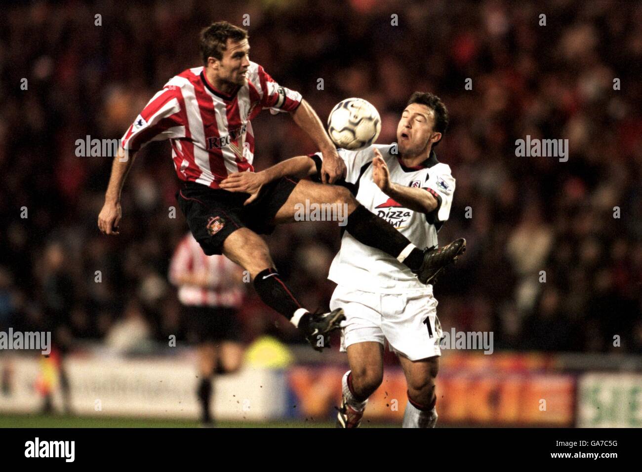 Soccer - FA Barclaycard Premiership - Sunderland v Fulham. Sunderland's Micahel Gray shuts out Fulham's Steed Malbranque Stock Photo