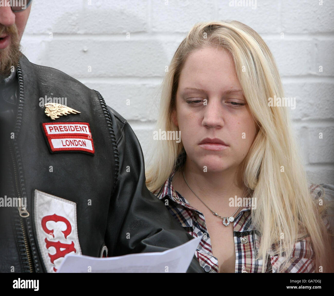 Rebecca Smith, 25, the girlfriend of murdered Hell's Angel Gerry Tobin, and the President of the London Hell's Angels Marcus Berriman face the media at Warr's Harley-Davidson Motorcycles in Mottingham, south-east London. Stock Photo