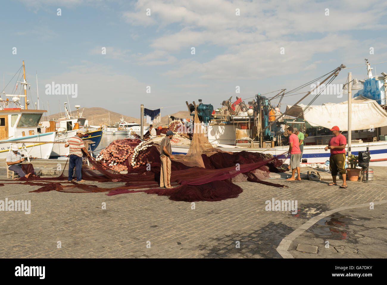 Paros, Greece 15 August 2015. Morning at Naoussa in Greece with fishermen doing their every day work. Stock Photo