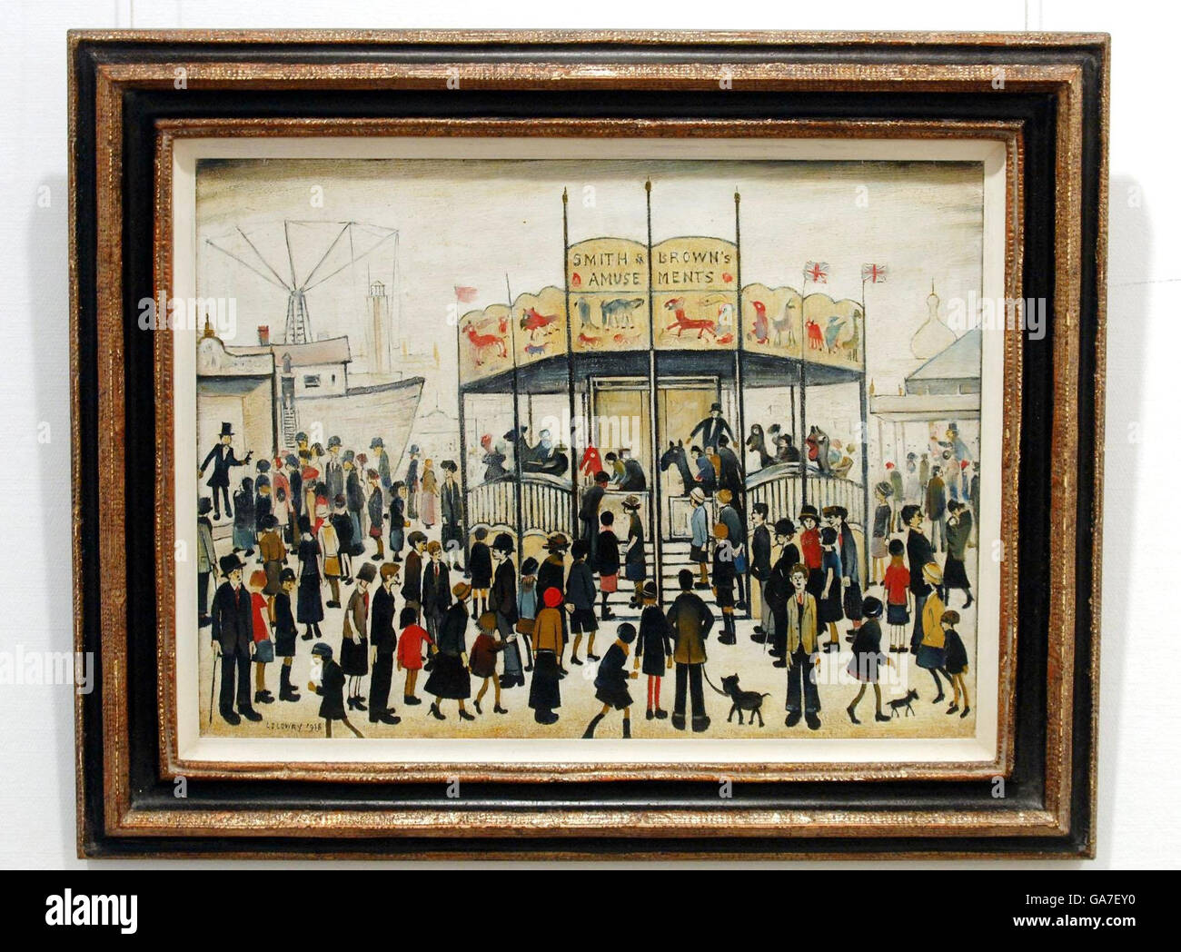 The painting called 'A Fairground', one of the two LS Lowry paintings to be auctioned at Sotheby's on December 13. Stock Photo