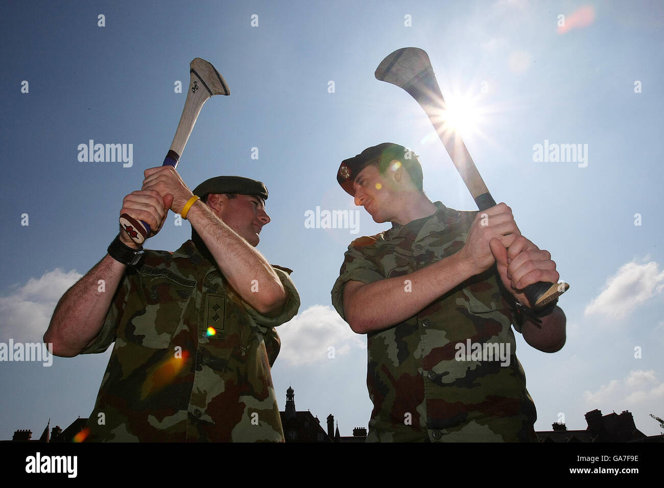 Two members of the Irish Defense forces Lieutenant Andrew Shaughnessey (1st Cavalry Squadron) from Kilmallock, Limerick (left) squares against Private Eoin Larkin (3rd Infantry Battalion Kilkenny) from James Stephens Club Kilkenny in McKee Barracks where they will face each other on the first Sunday in September in Croke Park in the All Ireland Hurling Final. Stock Photo