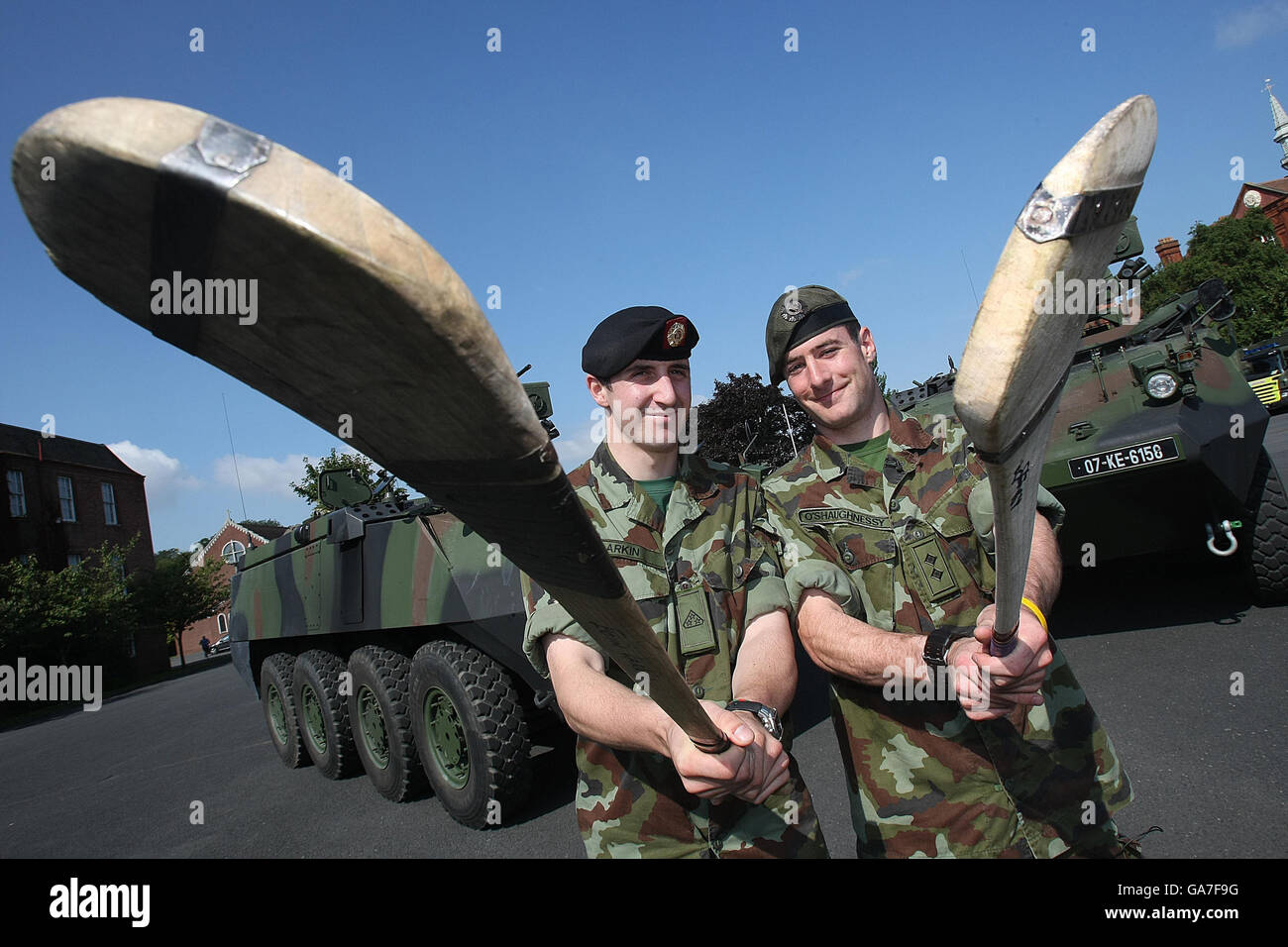 Two members of the Irish Defense forces Lieutenant Andrew Shaughnessey (1st Cavalry Squadron) from Kilmallock, Limerick (left) squares against Private Eoin Larkin (3rd Infantry Battalion Kilkenny) from James Stephens Club Kilkenny in McKee Barracks where they will face each other on the first Sunday in September in Croke Park in the All Ireland Hurling Final. Stock Photo