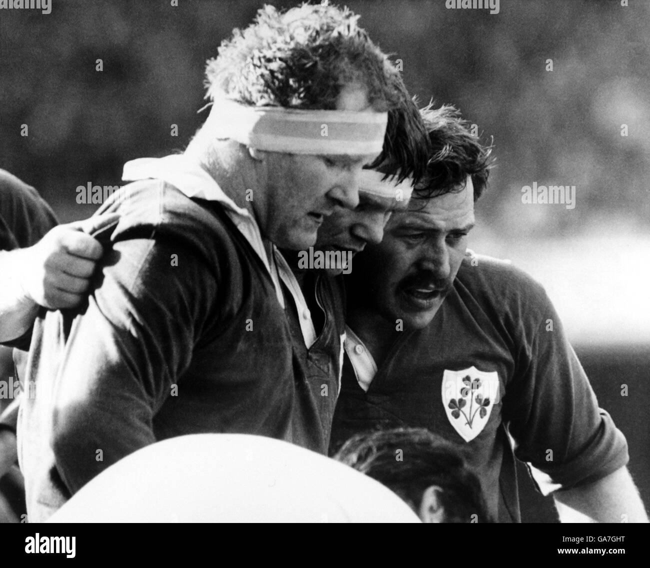 (L-R) Ireland's front row prepare for a scrum: Ginger McLoughlin, Ciaran Fitzgerald and Phil Orr. Stock Photo