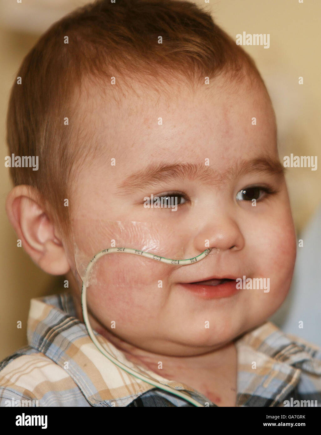 Artificial heart boy leaves hospital 120 days hires stock photography