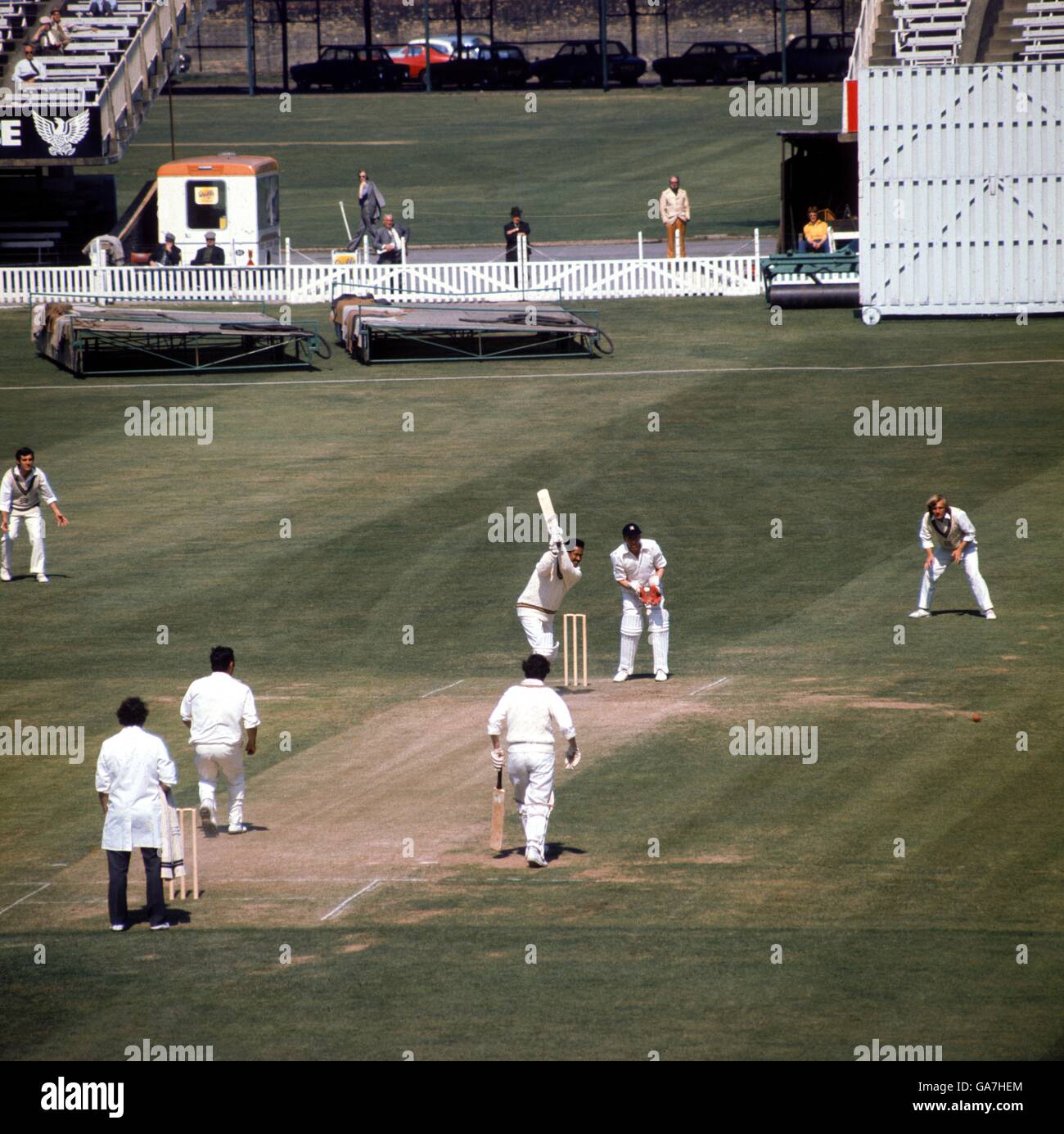 Nottinghamshire's Garfield Sobers (c) drives a ball from Middlesex's Keith Jones (bottom l) to the boundary Stock Photo