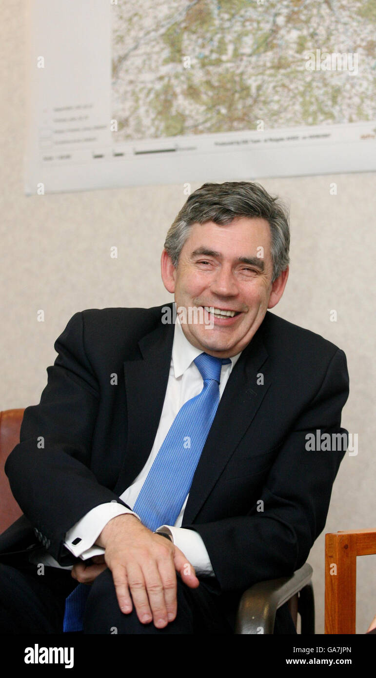 British Prime Minister Gordon Brown speaks with local farmers at the Regional Disease Control Centre in Reigate, Surrey, following the outbreak of foot and mouth in the county. Stock Photo