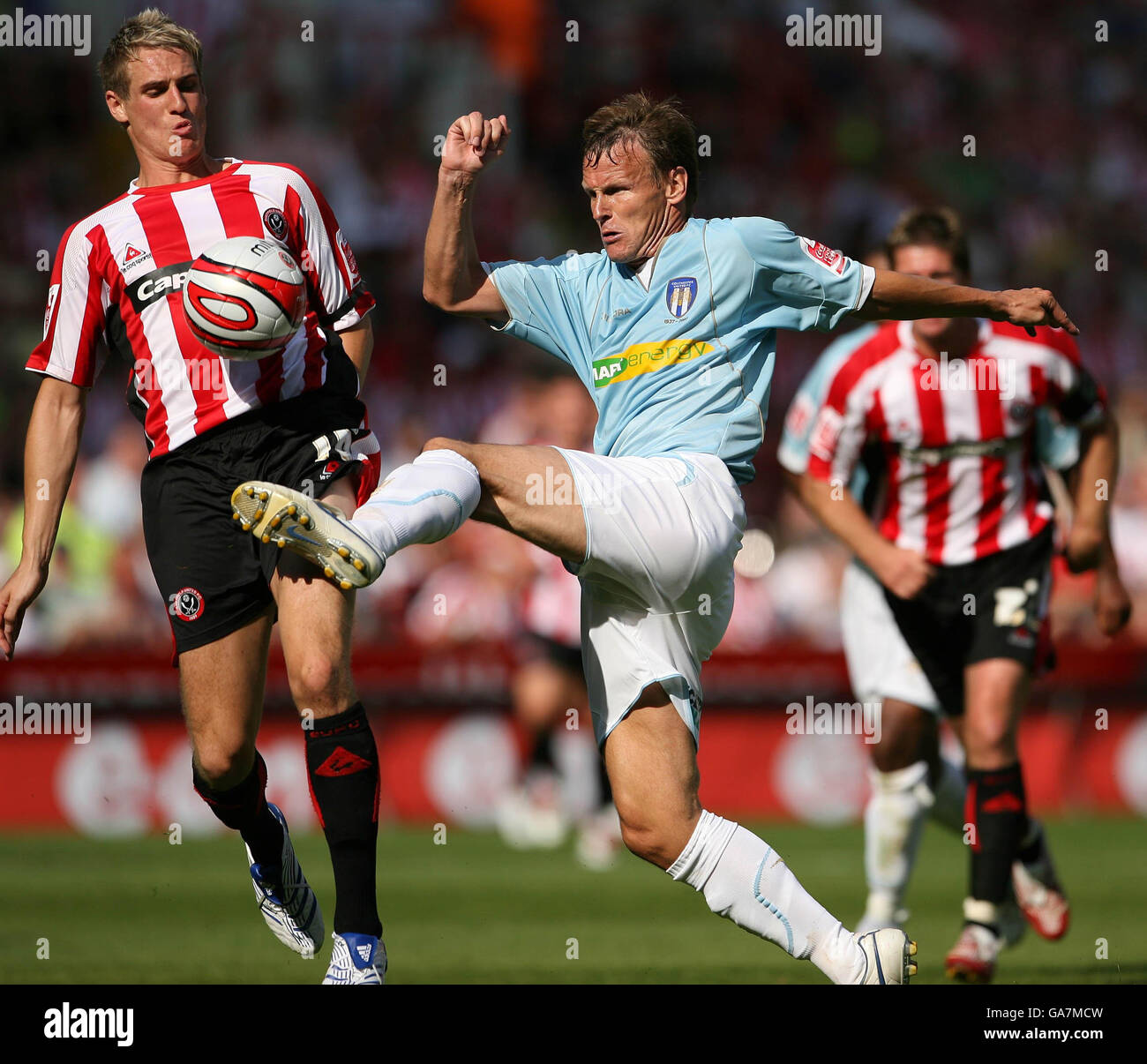Colchester United's Teddy Sheringham in action against Sheffield United's David Carney (left) during the Coca-Cola Football League Championship match at Bramall Lane, Sheffield. Stock Photo