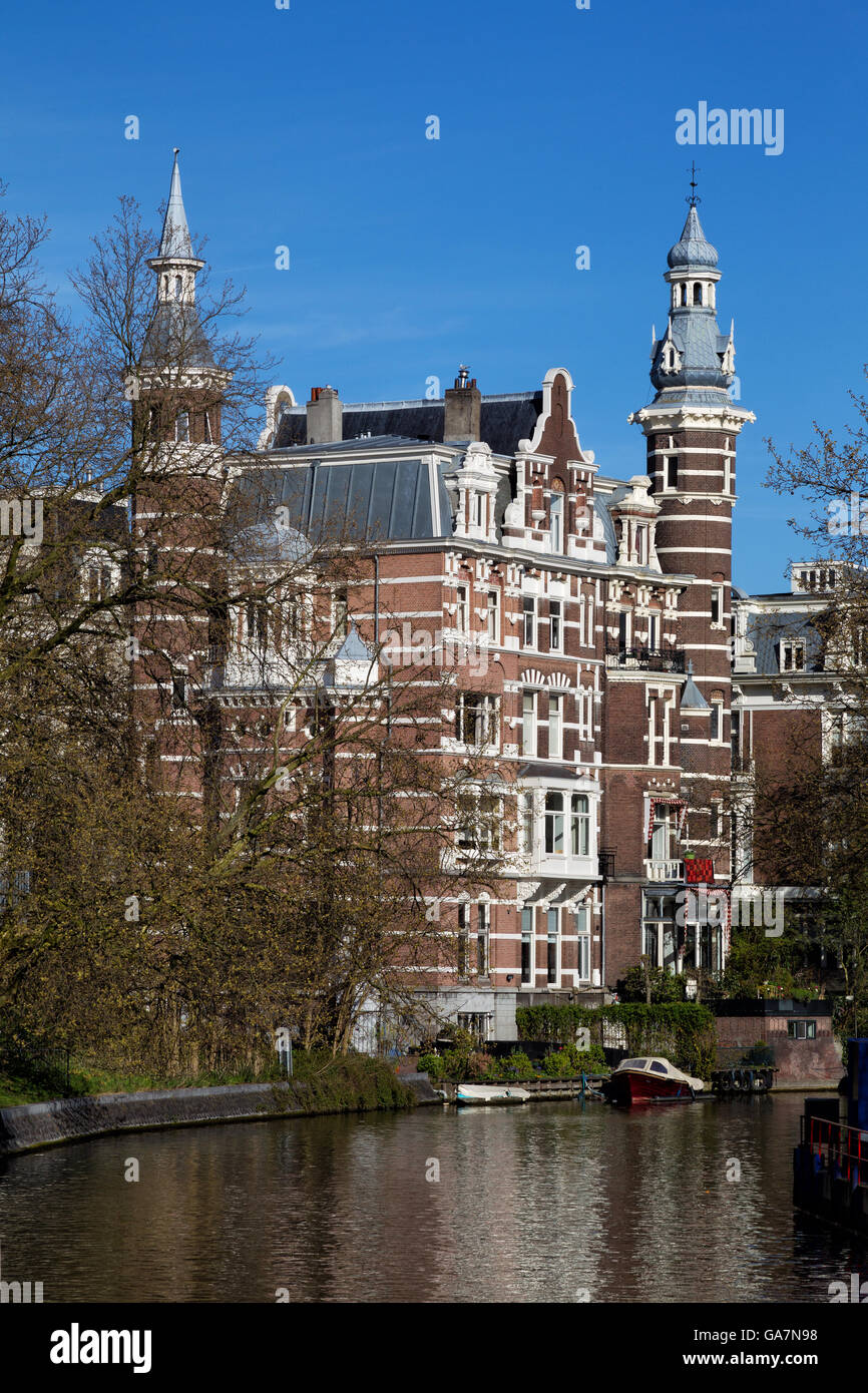 Luxury mansion on a canal in Amsterdam, Netherlands in spring Stock