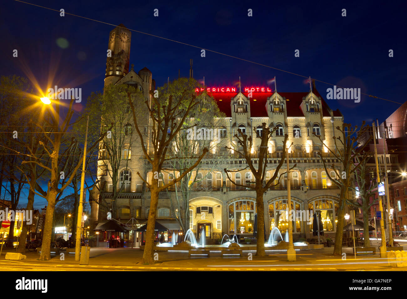 Night shot of the American Hotel in downtown Amsterdam, Netherlands in spring. Stock Photo