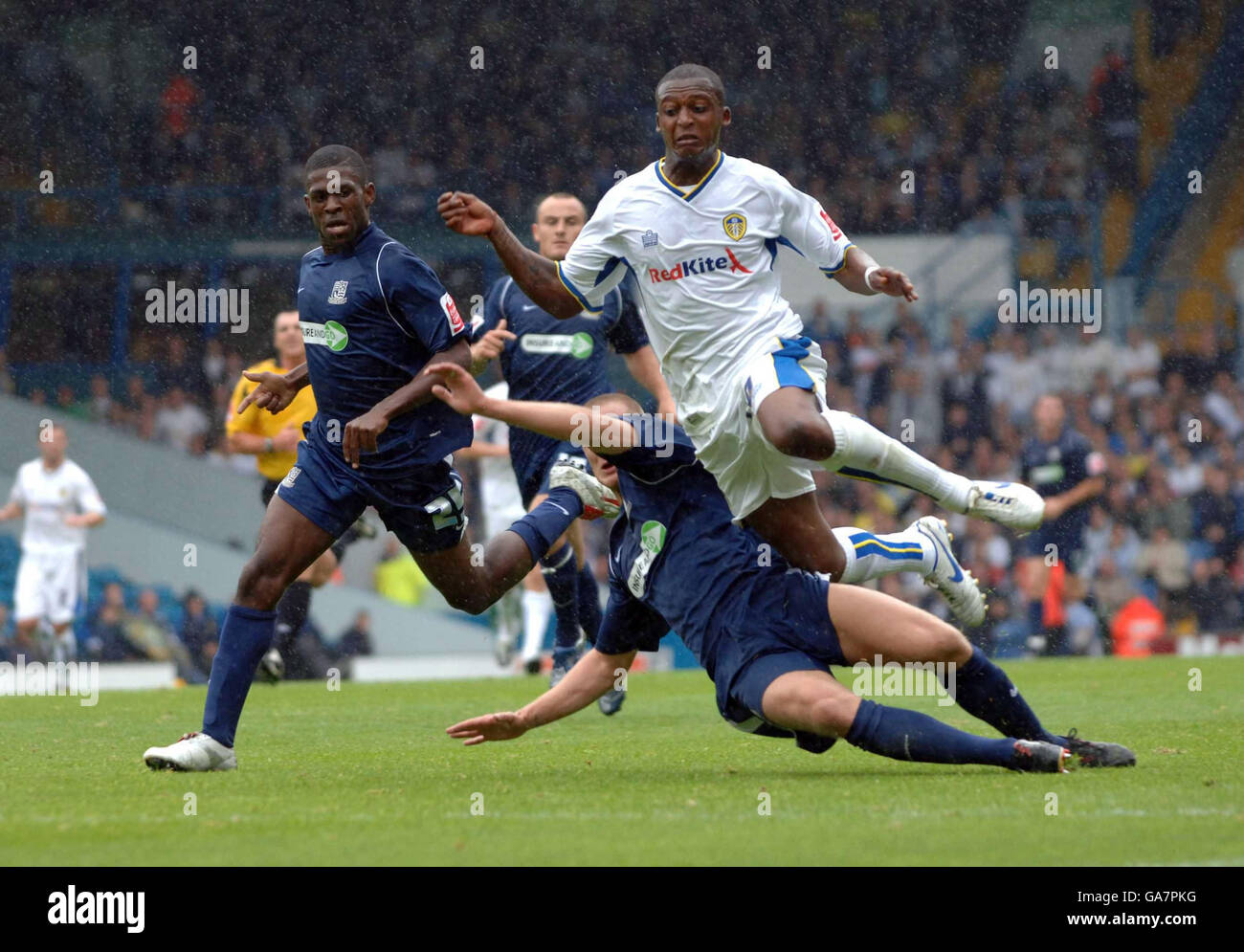 Leeds United's Tresor Kandol (top) is brought down by Southend's Peter Clarke during the Coca-Cola Football League One match at Elland Road, Leeds. Stock Photo