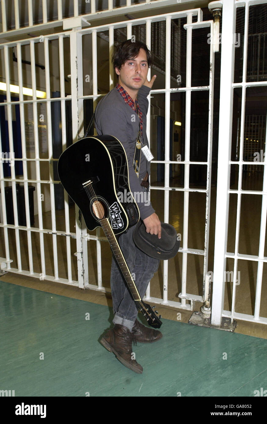 Carl Barat of Dirty Pretty Things poses for photos at Pentonville Prison, north London, where he and his band performed a gig in aid of charity Wasted Youth. Stock Photo