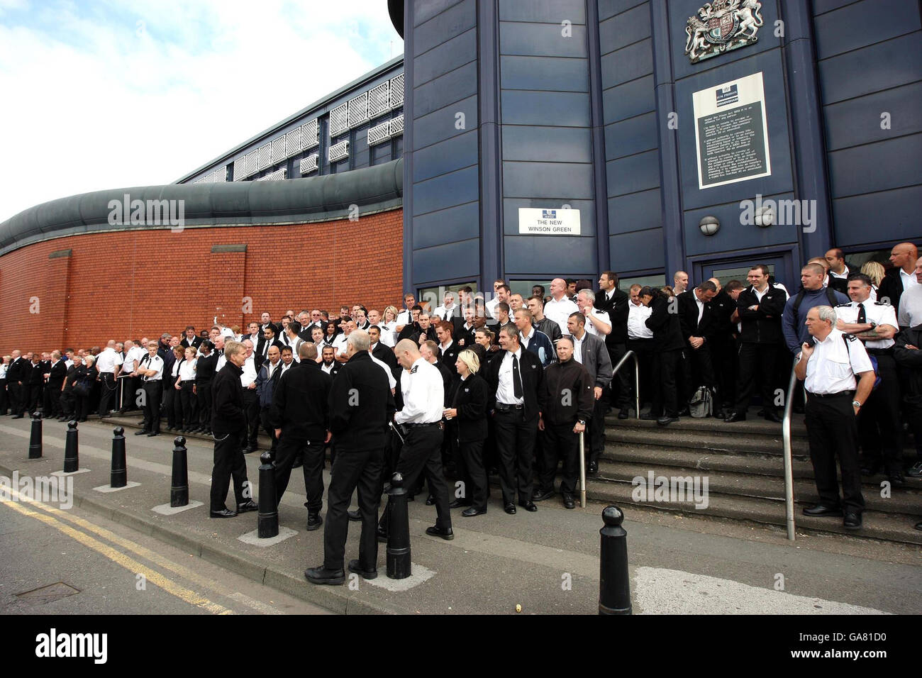 Staff outside The New Winson Green prison in Birmingham , as thousands of prison officers staged a national strike over pay today, plunging the service into a fresh state of crisis. Stock Photo