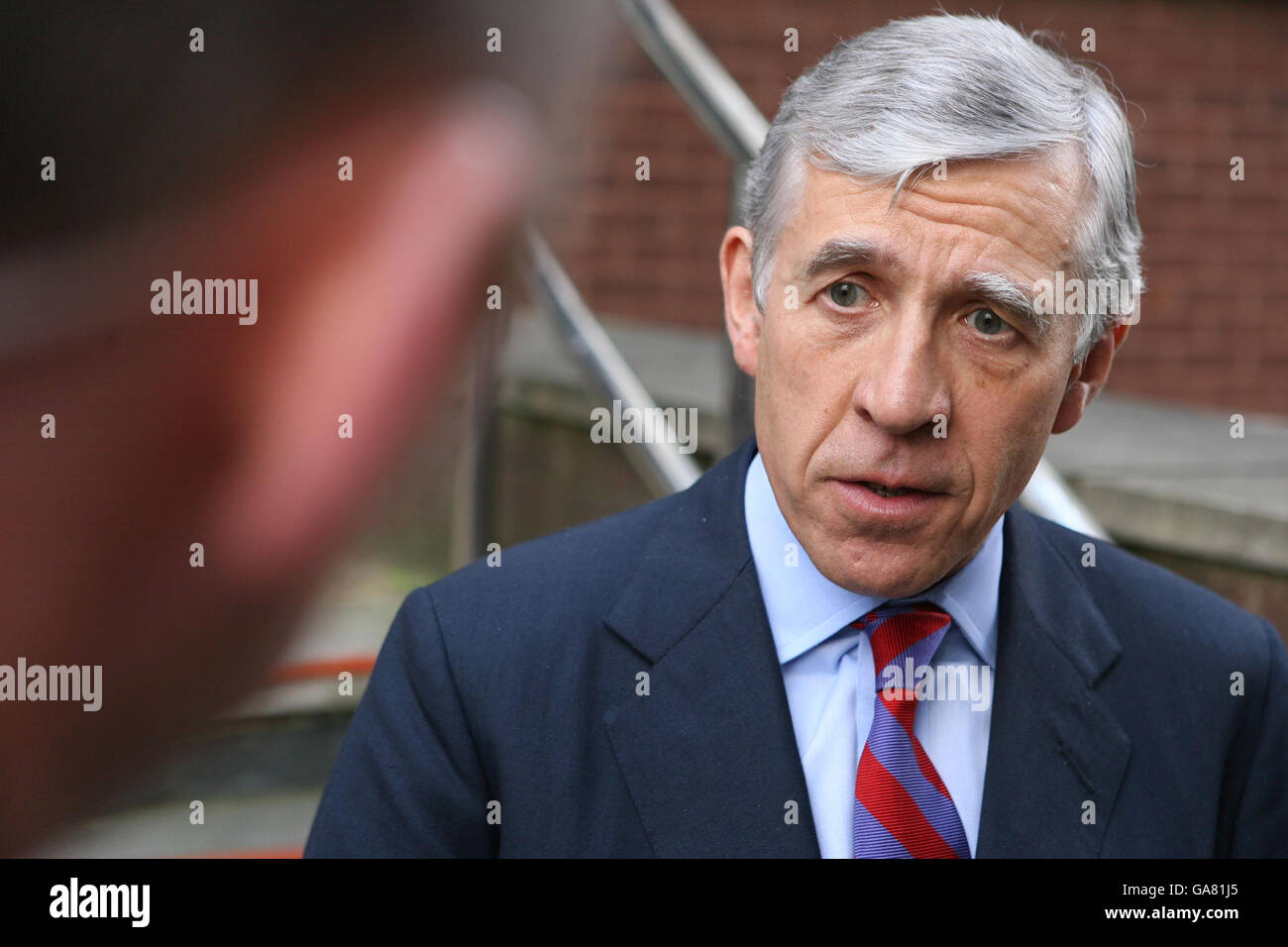 Justice Minister Jack Straw speaks to the press outside Balham Youth