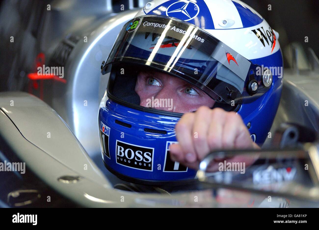 Formula One Motor Racing - Australian Grand Prix - Practice. McLarens David Coulthard questions his vehicles steering during provisional qualifying session at Albert Park Stock Photo