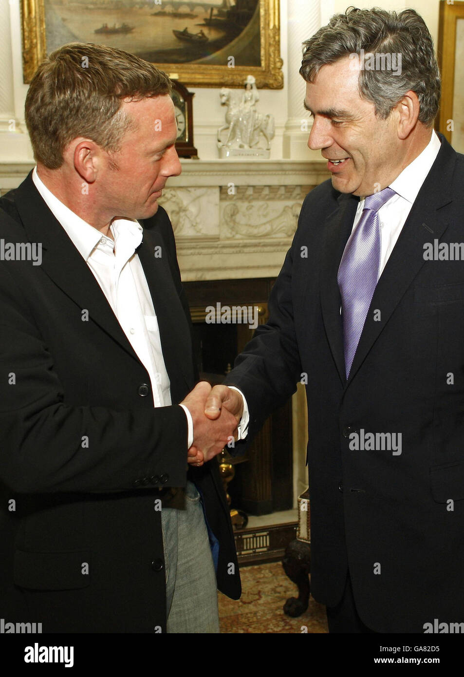 John Smeaton, the Glasgow baggage handler who tackled an alleged terrorist, meets British Prime Minister Gordon Brown at No.10 Downing Street. Stock Photo