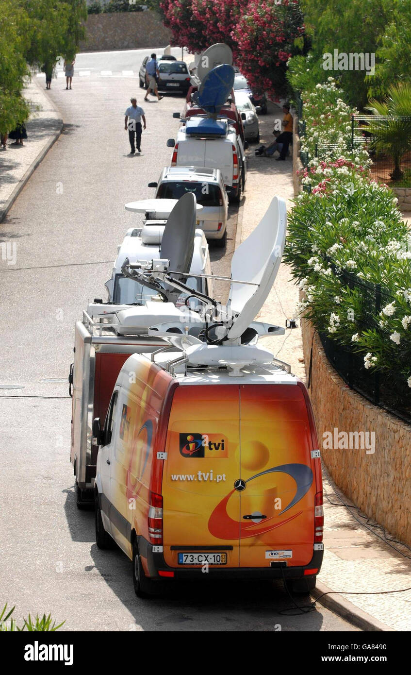 Vans from Television news channels from all over the world are parked  outside the apartment in Praia Du Luz, Portugal, where Madeleine McCann  went missing on May 3rd Stock Photo - Alamy