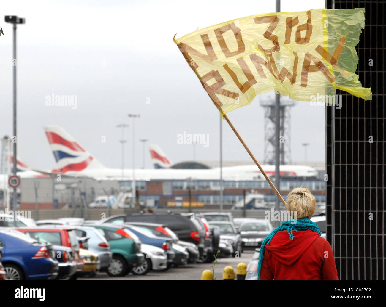 Climate change camp at Heathrow. A protester from the climate change camp, demonstrating outside the offices of BAA at Heathrow. Stock Photo