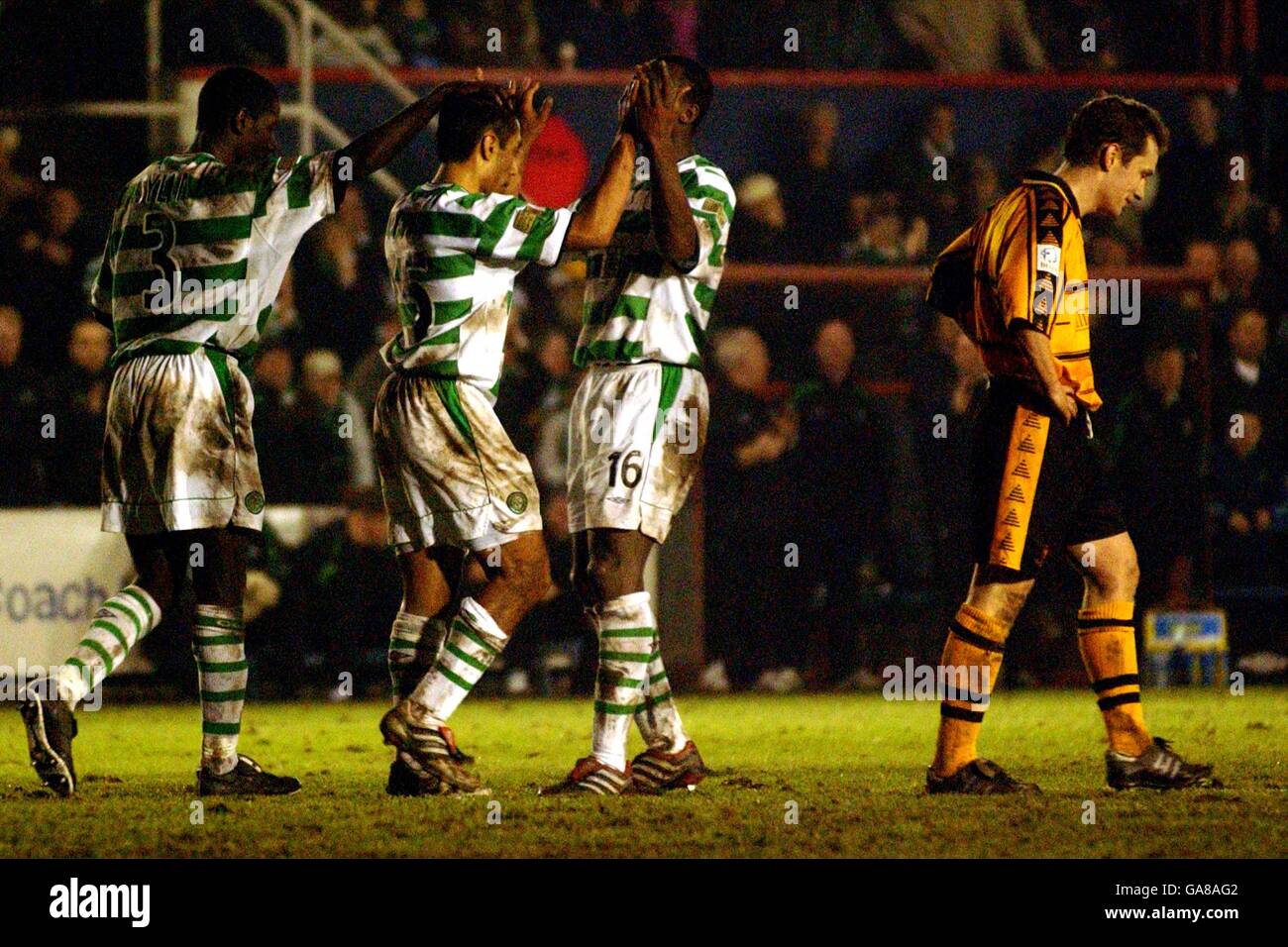 Celtic's Bobby Petta (r) celebrates scoring the fourth goal with ...