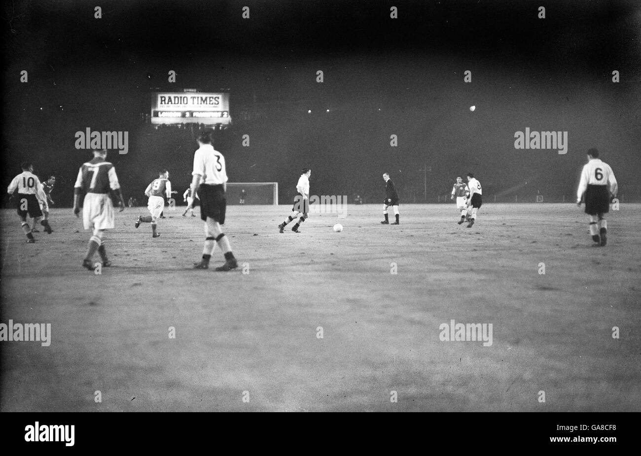Action during the first match at Wembley to be played under floodlights  Stock Photo - Alamy