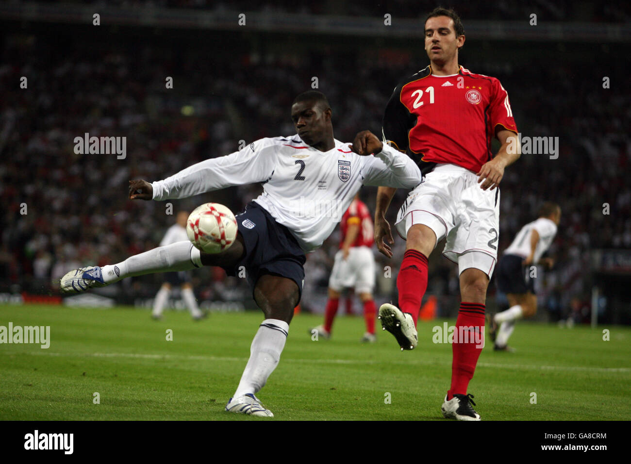 Soccer - International Friendly - England v Germany - Wembley Stadium. Germany's Christoph Metzelder (r) and England's Micah Richards (l) battle for the ball Stock Photo