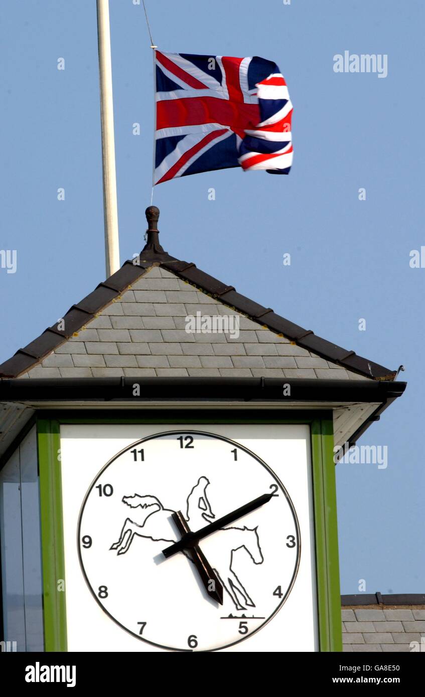 Horse Racing - Martell Grand National - Aintree. The flag at Aintree racecourse flies at half mast after the death of the Queen Mother Stock Photo