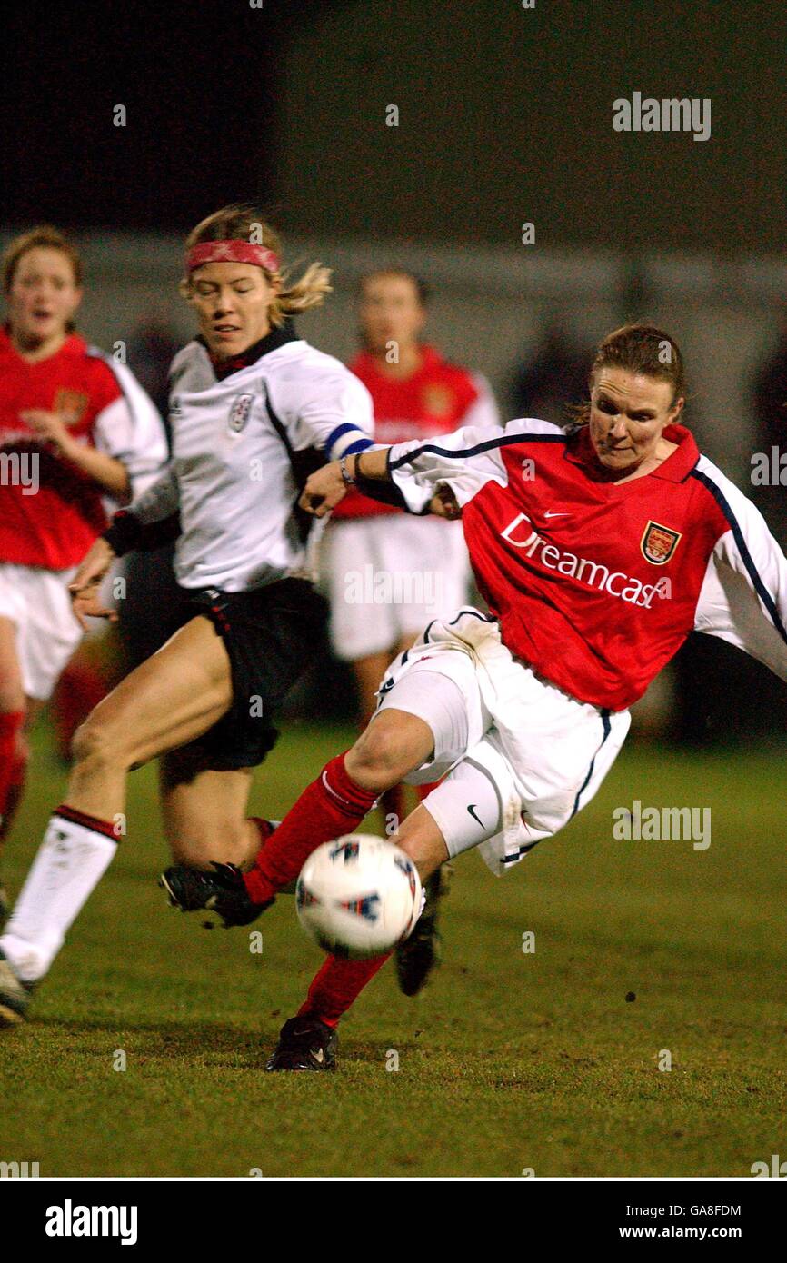 Soccer - Women's League Cup - Fulham v Arsenal. Fulham's Marianne Pettersen (l)chases Arsenal's Sian Williams (r) for the ball Stock Photo