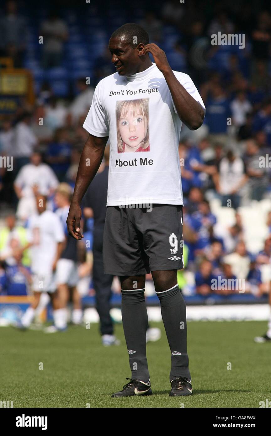 Wigan Athletic's Emile Heskey wearing a Madeline McCann 'Dont you forget about me' t-shirt before kick off Stock Photo