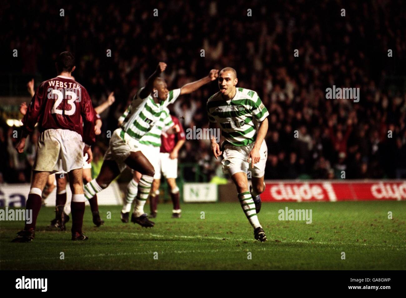 Soccer - Bank Of Scotland Premier League - Celtic v Heart Of Midlothian. Celtic's Henrik Larsson celebrates scoring the first goal against Hearts Stock Photo