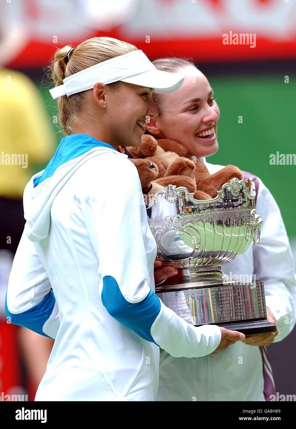 Anna kournikova and martina hingis celebrate their doubles victory hi