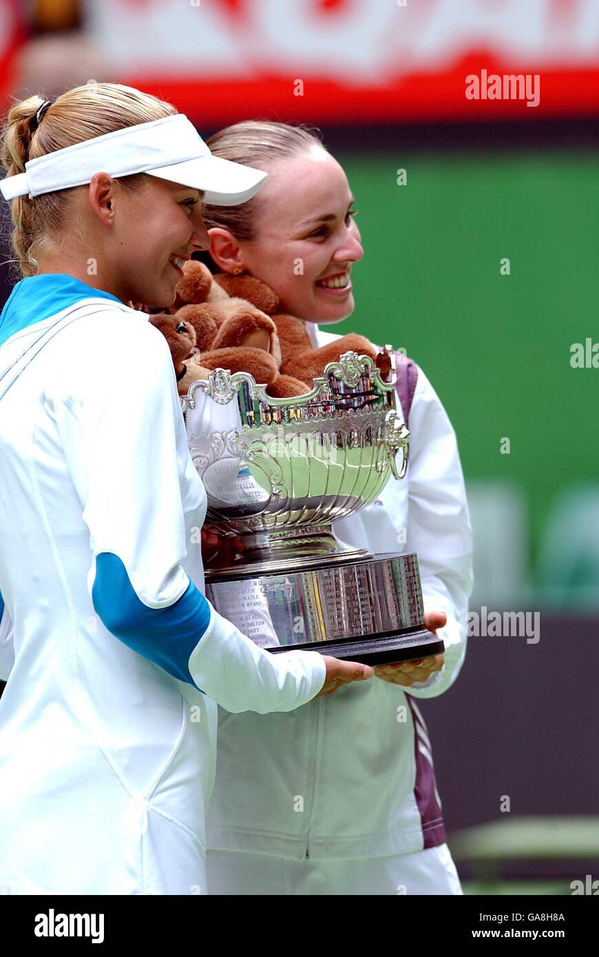 Anna kournikova and martina hingis celebrate their doubles victory hi