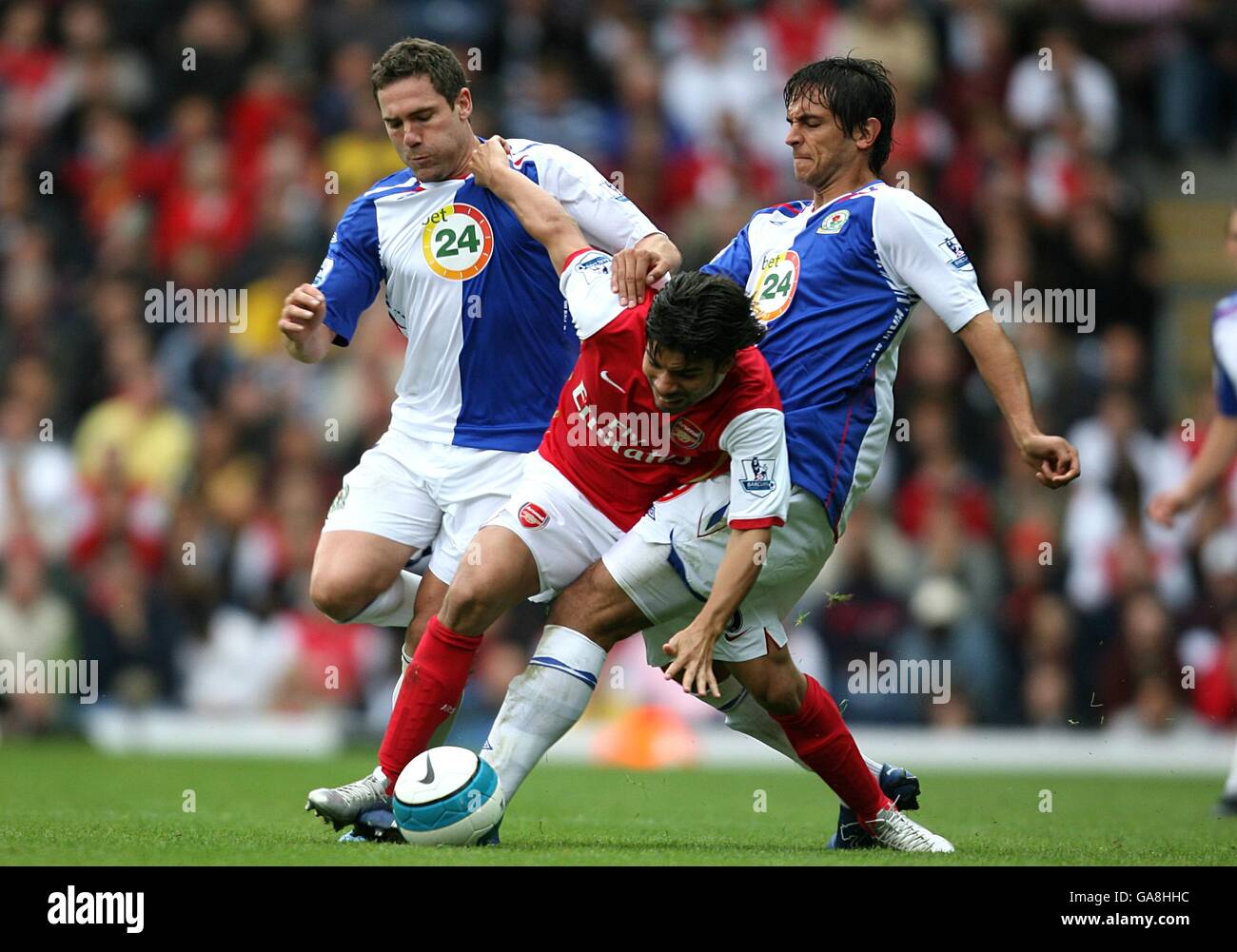 Ivan Petryak of MOL Fehervar FC dribbles between Franck Boli of