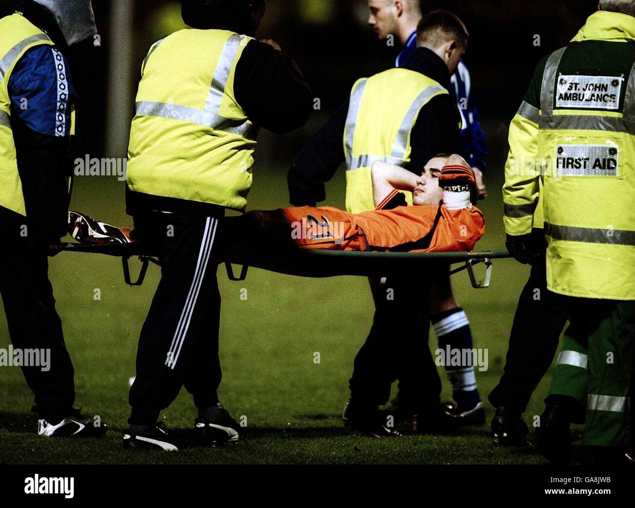 Bristol Rovers' Captain Lewis Hogg is stretchered off the field after a first half clash with Gillingham's Paul Smith Stock Photo