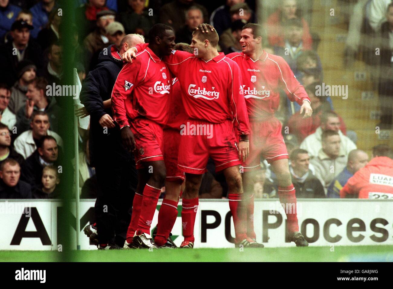 Liverpool's Emile Heskey (l) is congratulated on scoring by teammates Steven Gerrard (c) and Jamie Carragher (r) Stock Photo