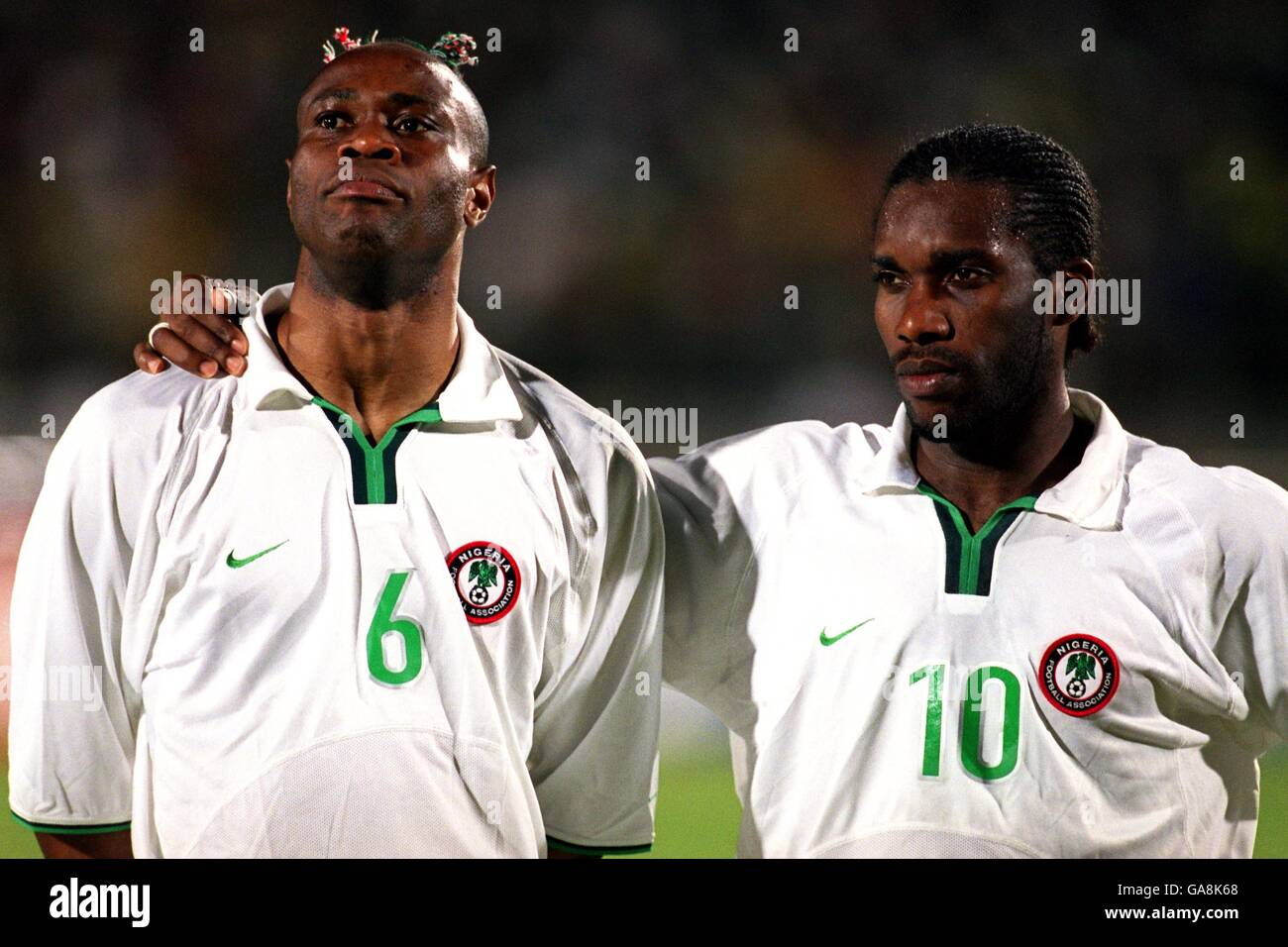 Soccer - African Nations Cup Mali 2002 - Group A - Mali v Nigeria. Nigeria's Taribo West (l) and Austine Okocha (r) Stock Photo