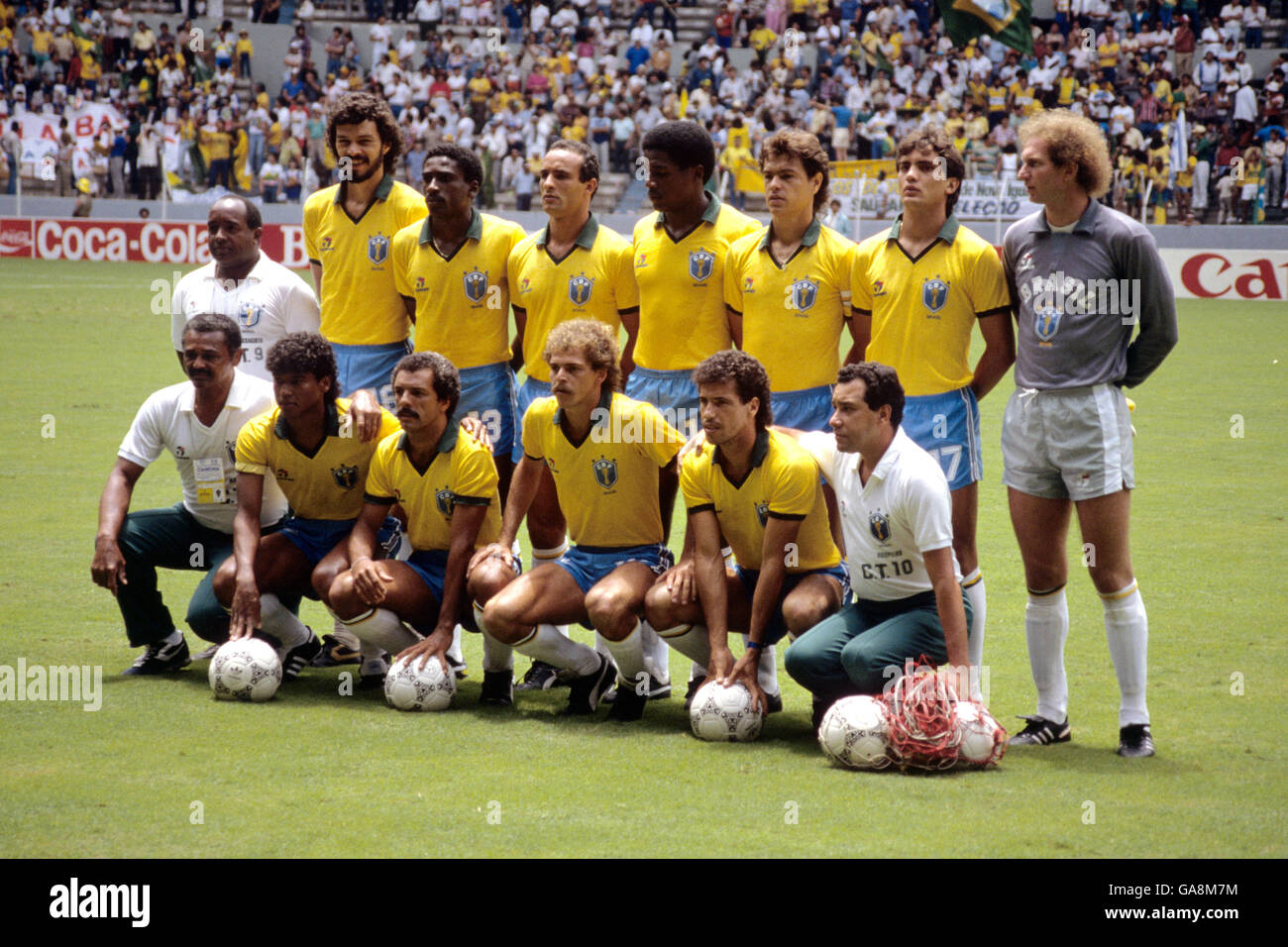 Brazil team group: (back row, l-r) trainer, Socrates, Josimar, Elzo, Julio Cesar, Edinho, Branco, Carlos; (front row, l-r) trainer, Muller, Junior, Alemao, Careca, coach Tele Santana Stock Photo