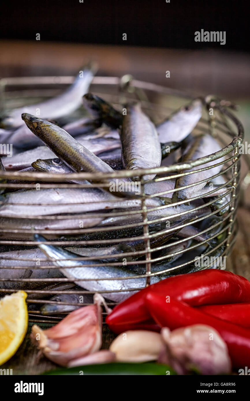 Fresh sardines with garlic, lemon and jalapeno peppers Stock Photo Alamy