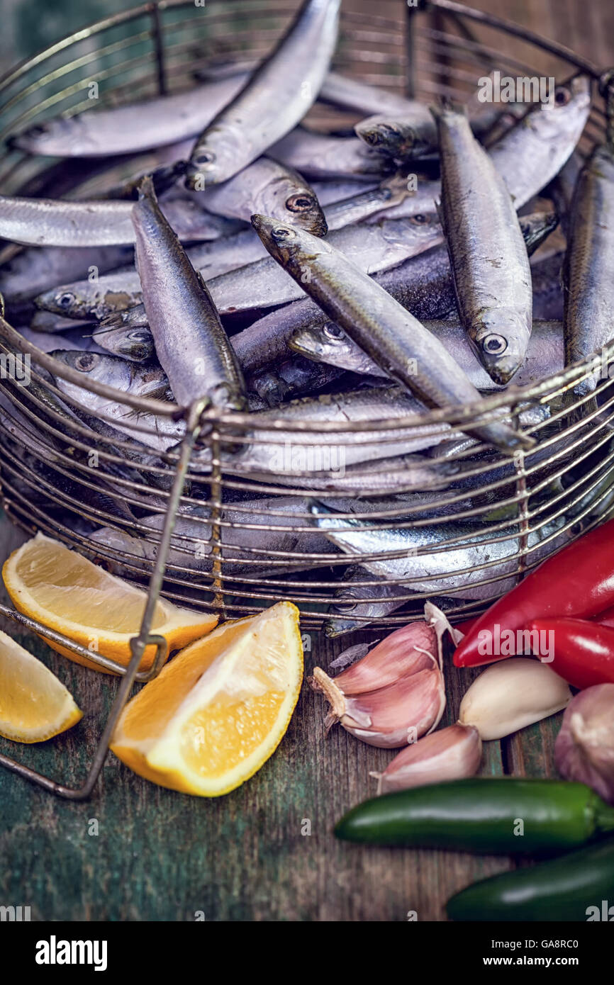 Fresh sardines with garlic, lemon and jalapeno peppers Stock Photo Alamy