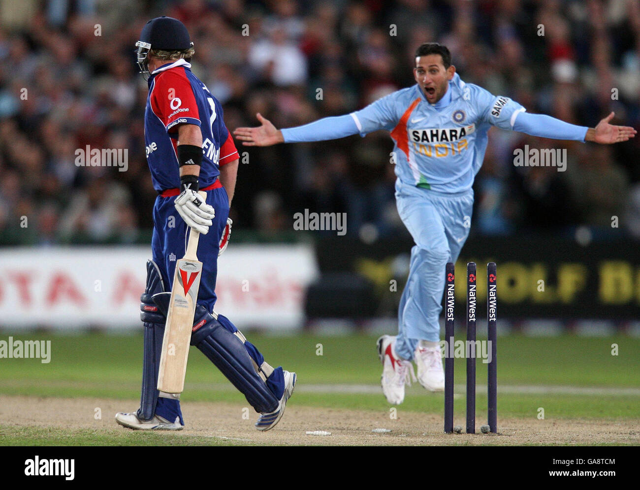 England's Ian Bell looks back at his stumps after being bowled by India's Ajit Agarkar during the Fourth NatWest One Day International at Old Trafford, Manchester. Stock Photo