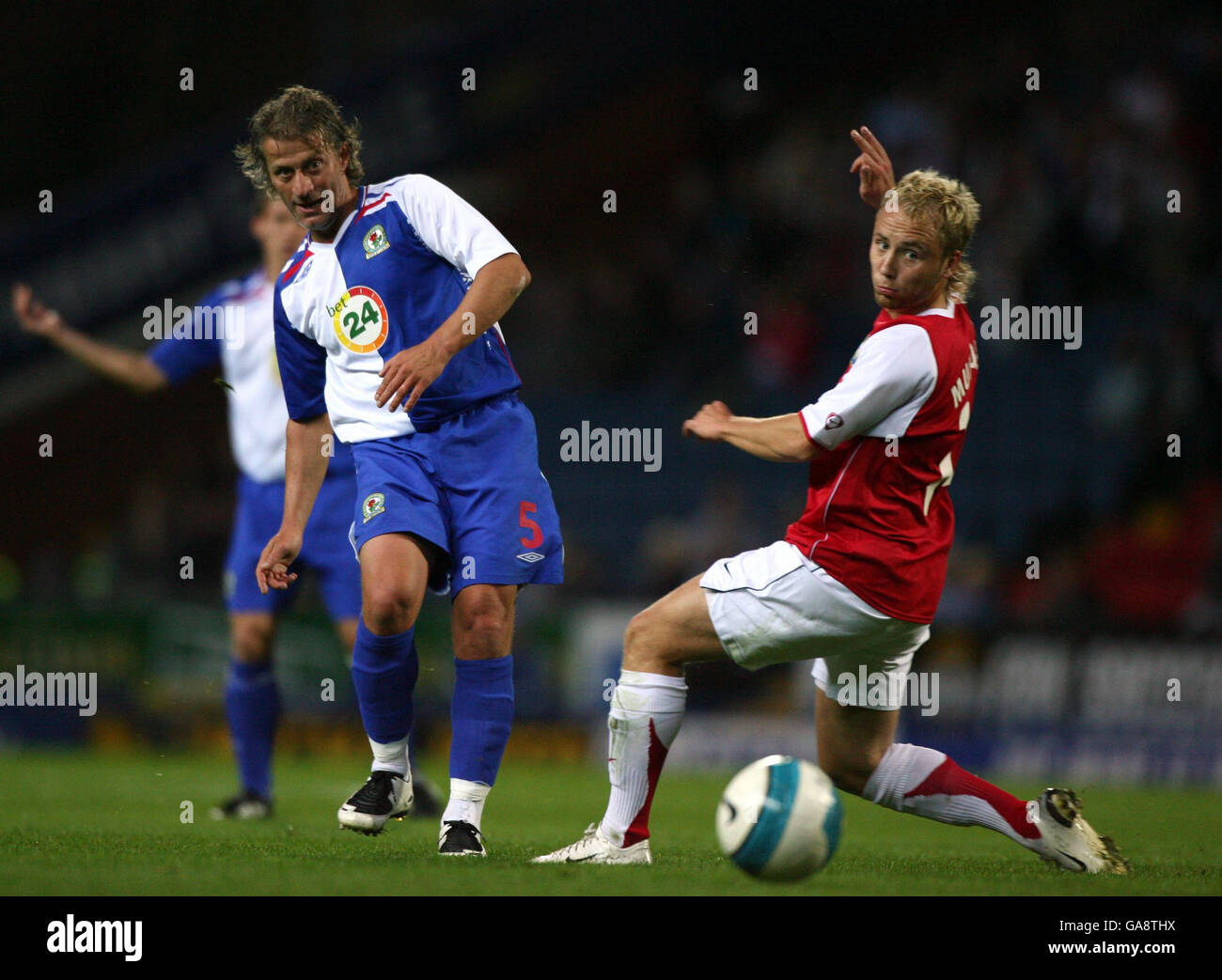 Blackburn Rovers' Tugay Kerimoglu passes the ball past Mypa 47's Toni Huttunen during the UEFA Cup Second Qualifying Round Second Leg match at Ewood Park, Blackburn. Stock Photo