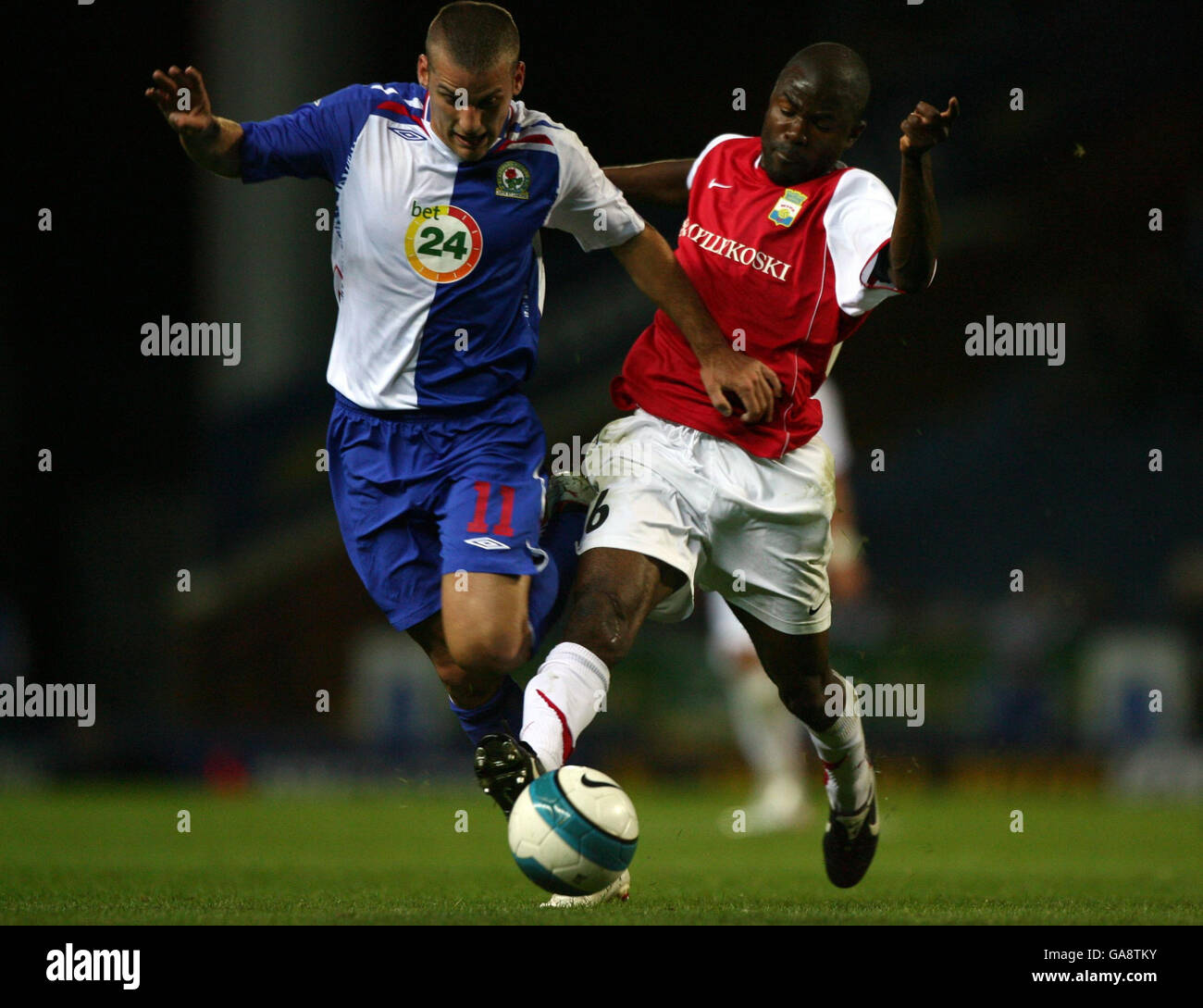 Blackburn Rovers' David Bentley (left) holds off a challenge from Mypa 47's Kuami Agboh during the UEFA Cup Second Qualifying Round Second Leg match at Ewood Park, Blackburn. Stock Photo