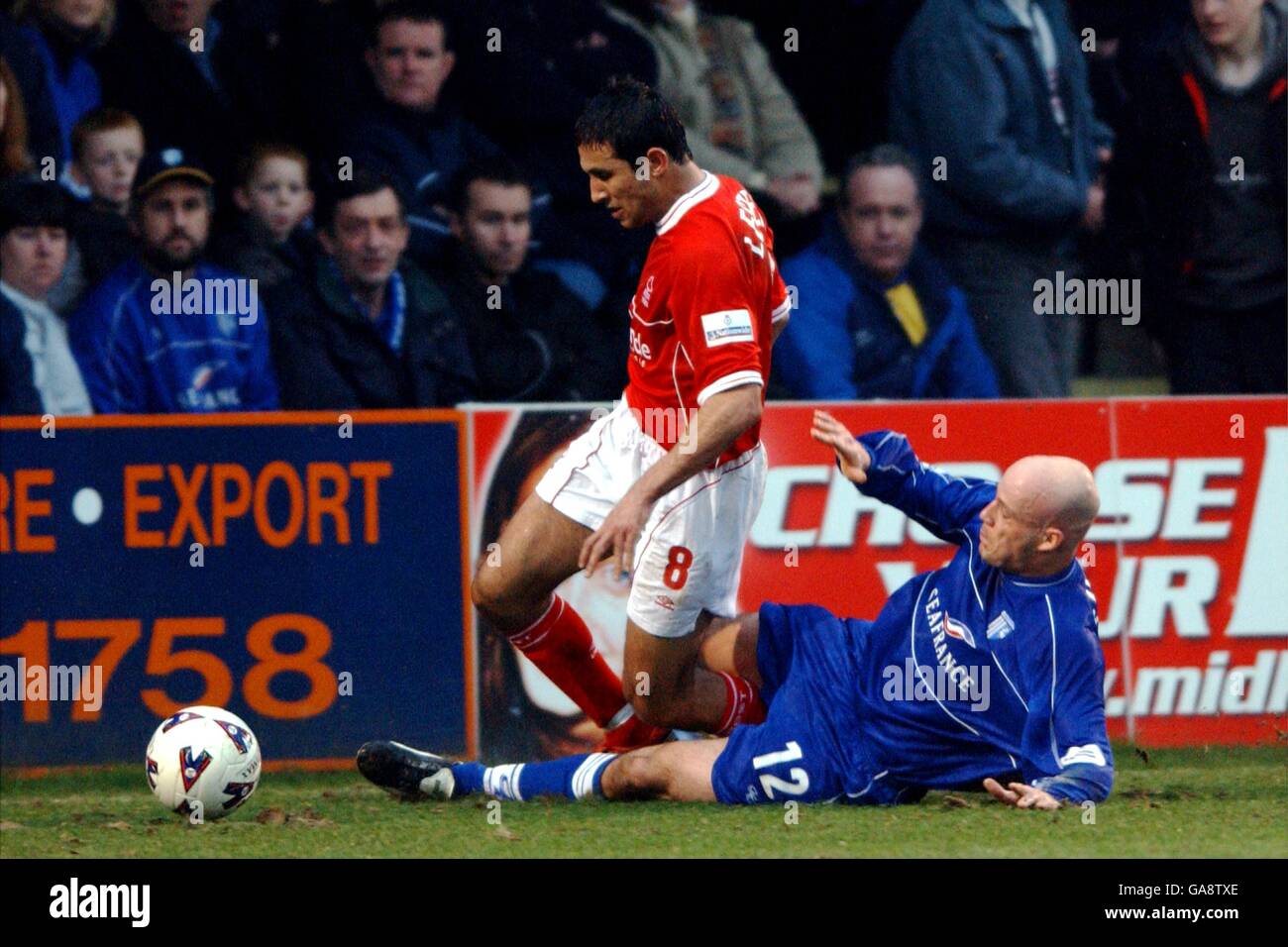 Soccer - Nationwide League Division One - Gillingham v Nottingham Forest. Nottingham Forest's Jack Lester is tackled by Gillingham's Paul Shaw Stock Photo