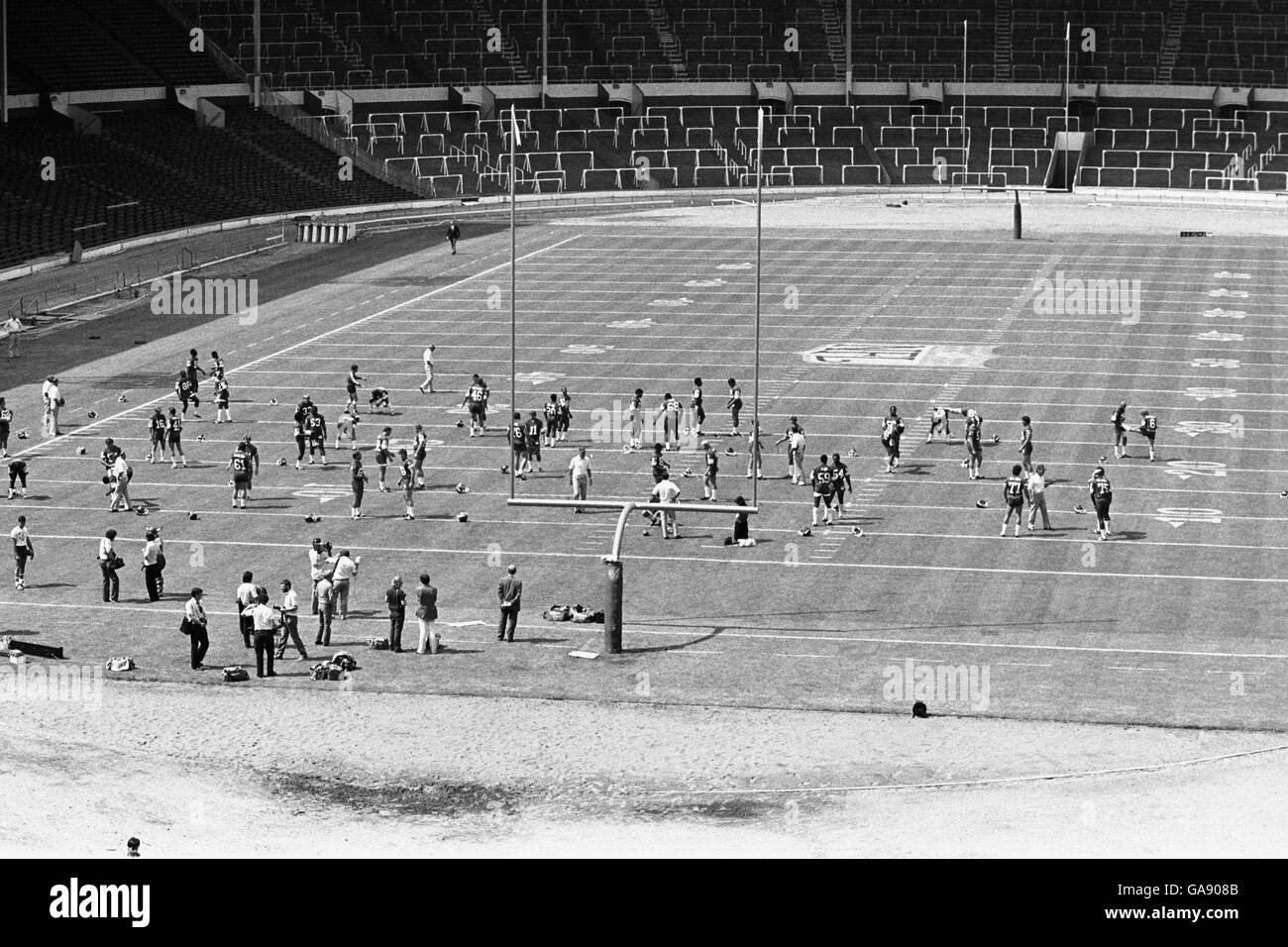 The Minnesota Vikings and the St. Louis Cardinals training at Wembley Stadium the day before the American Bowl Exhibition Match. A crowd of around 30,000 people turned up to watch the two NFL teams in action. Stock Photo